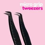 Black lash extension tweezers on pink background